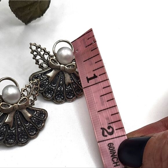 "5/$25" Silvertone Faux Pearl Angel Post Earrings - Picture 3 of 5